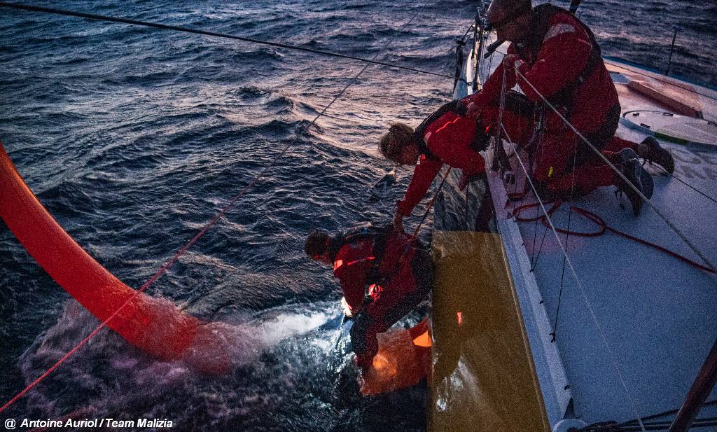 2023 Ocean Race - Malizia recover headsail from around foil